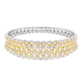 18 kt white gold diamond bangle adorned with 6.50 cts tw of diamonds going half-way around