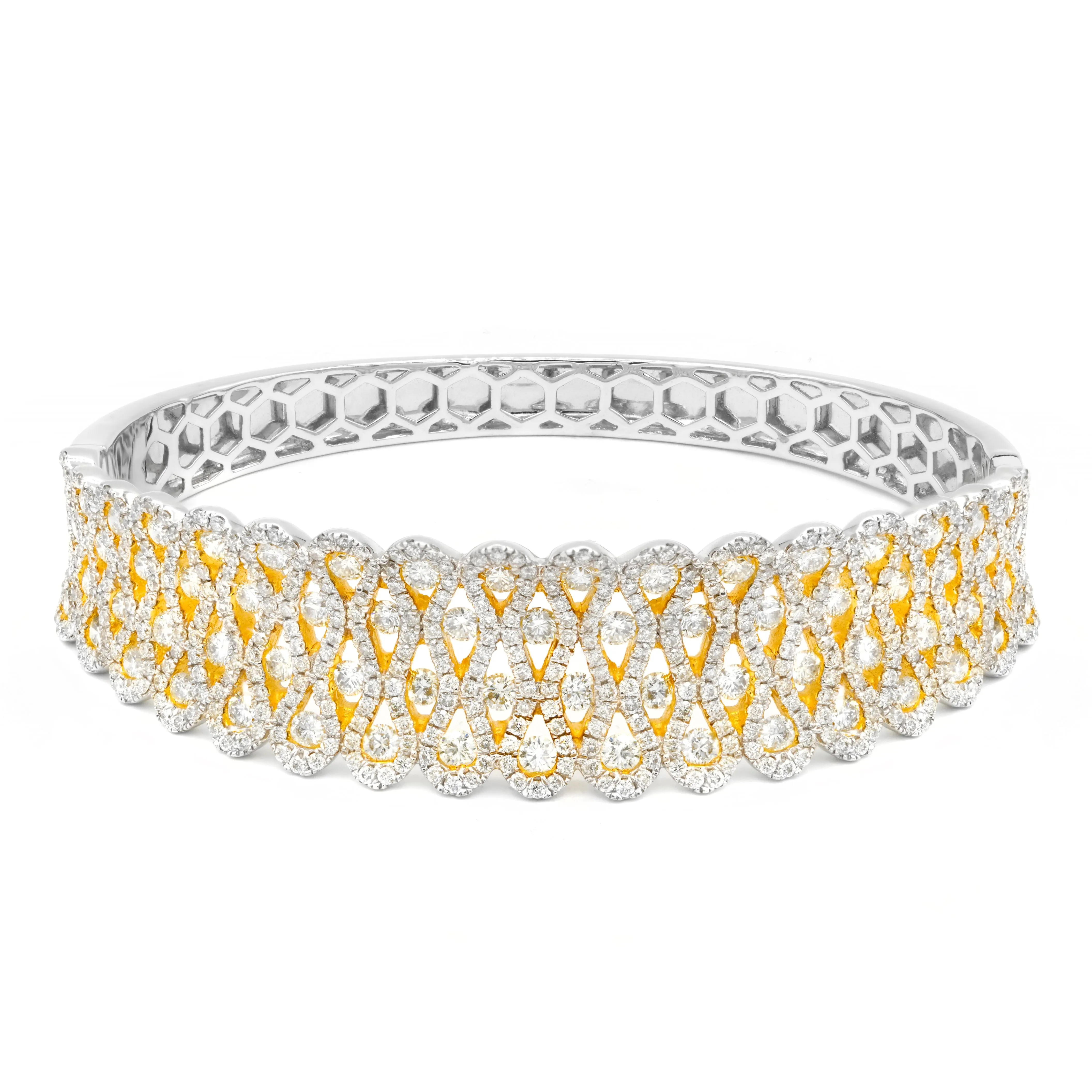 18 kt white gold diamond bangle adorned with 6.50 cts tw of diamonds going half-way around