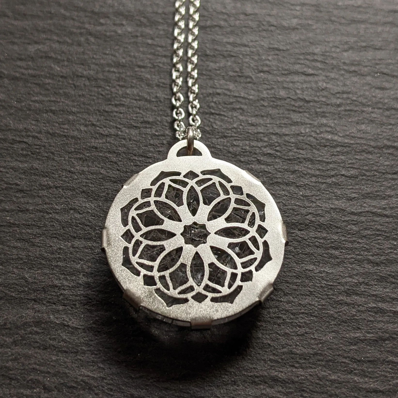 Handcut Tourmalated Quartz Mandala Pendant 2