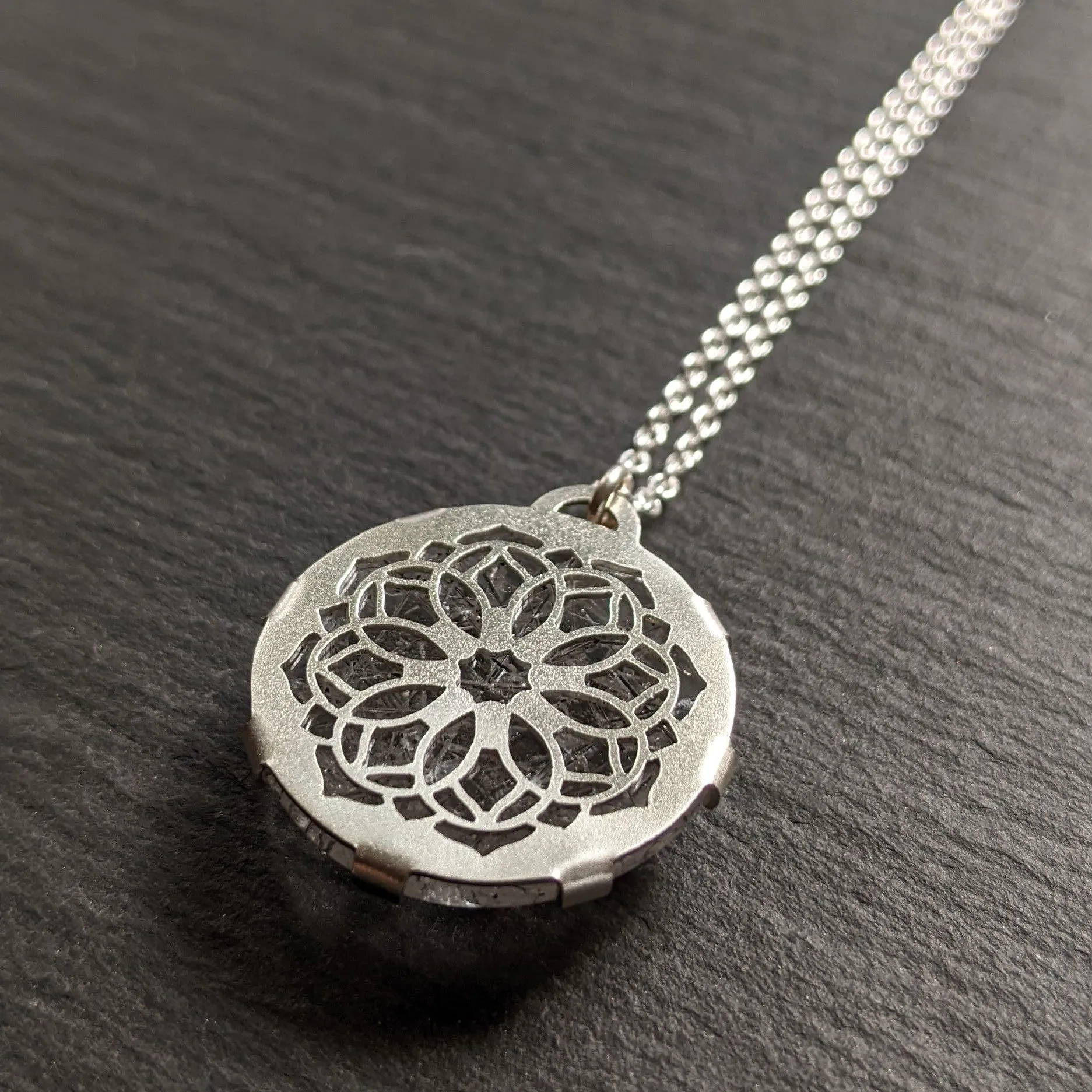 Handcut Tourmalated Quartz Mandala Pendant 2