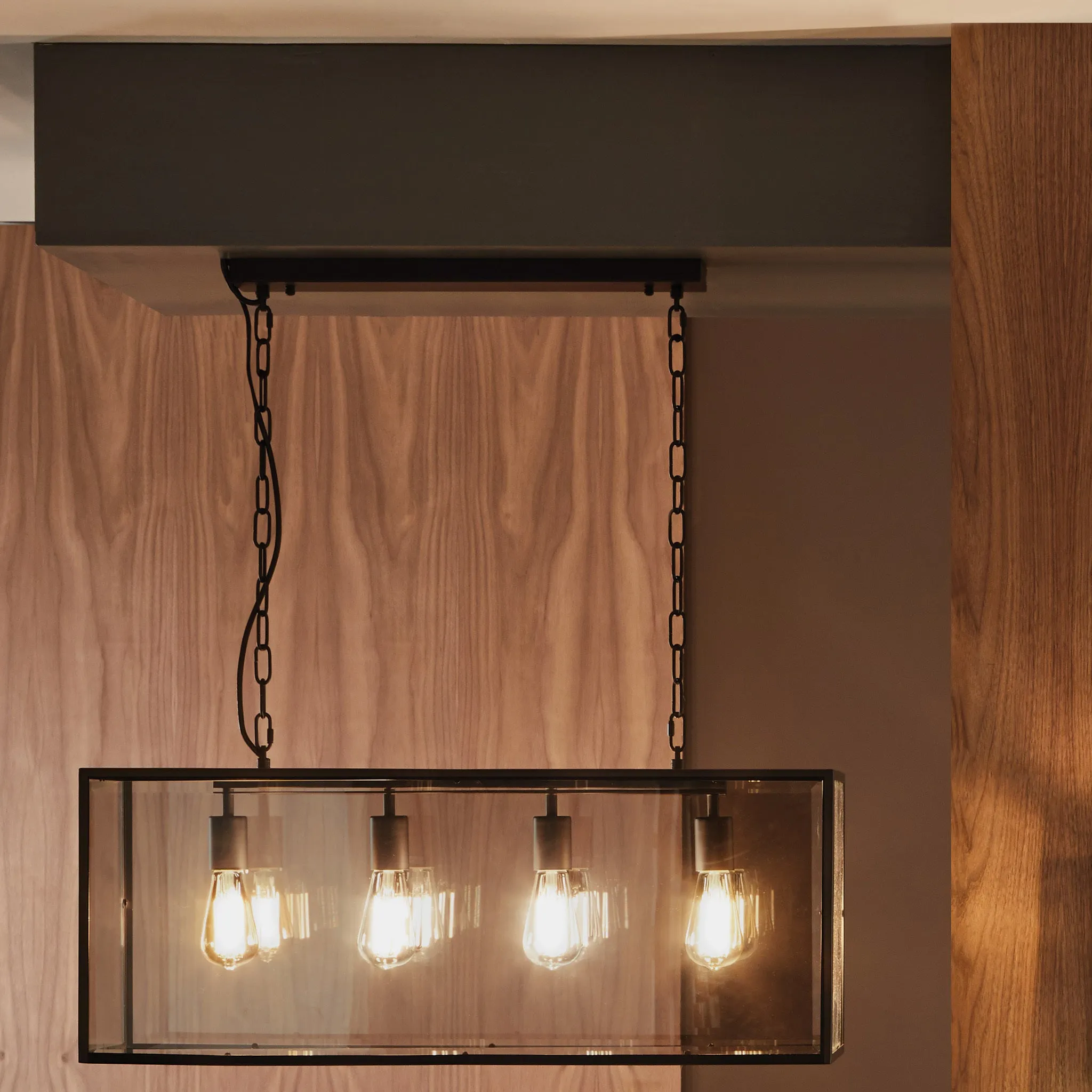 Llewellyn Matt Black Metal & Glass Four Bulb Pendant